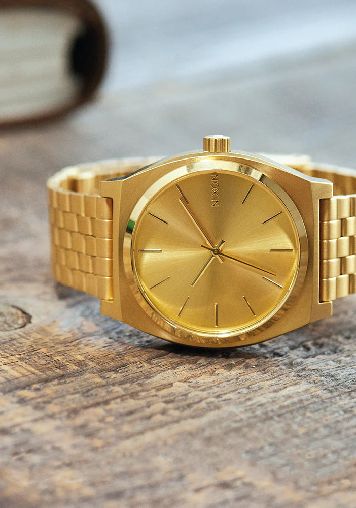 
                      
                        NIXON TIME TELLER GOLD
                      
                    